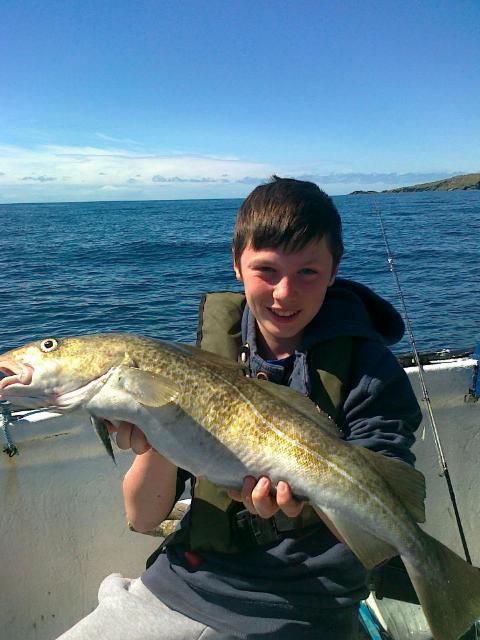 12-year-aold-Eamonn-Cooke-with_a_fine_cod_from_Aughrus_Bay.jpg