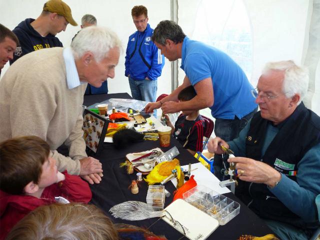 A_busy_fly_tying_marquee.jpg