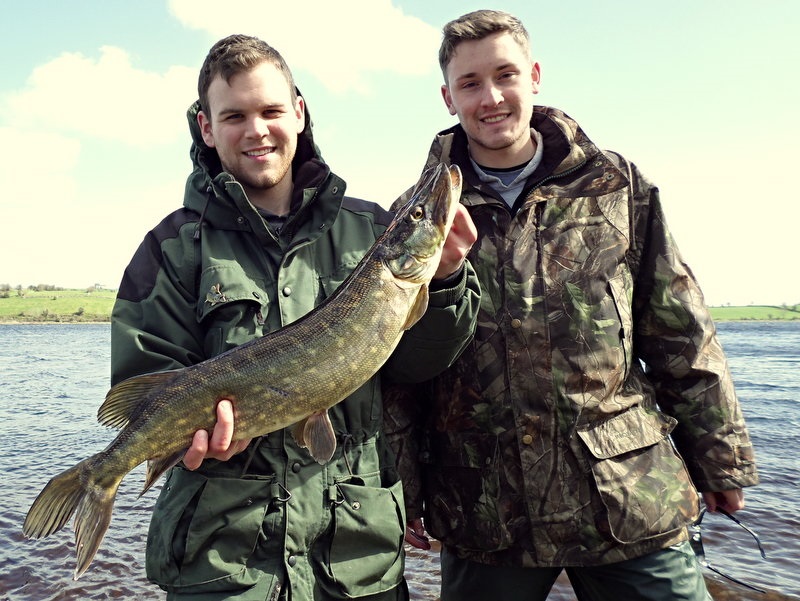US_visitors_Will_Rinehart___Andrew_Lindley_with_one_of_their_fly_caught_Mayo_pike.JPG