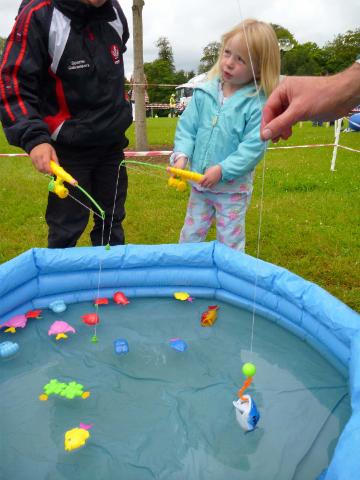 Young_Eabha_Walls_enjoys_the_toddlers_fun_fishing_pool.jpg