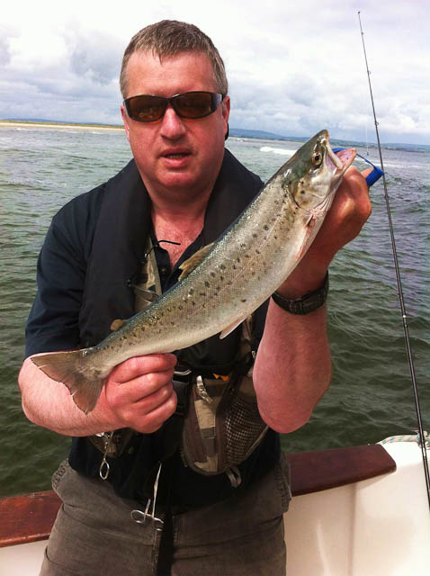 DesMcDonaghKilkennywith_a_fine_Moy_Estuary_sea_trout_on_Pegasus_with_Judd_Ruane.jpg