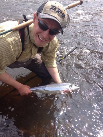 Freddie_Duncalf_Wales__releasing_a_small_grilse_on_the_Weir_Pool.jpg