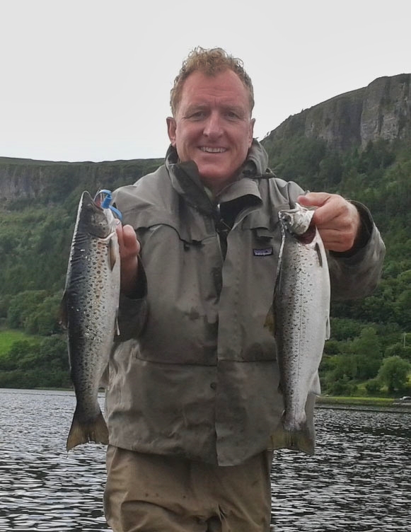 Ken_Kinsella_with_two_nice_Glencar_2lbs_sea_trout.jpg