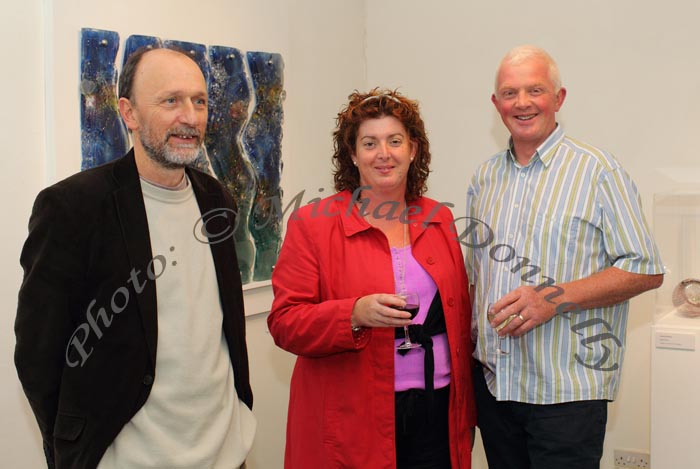 Pictured in the Linenhall Arts Centre at the official opening of "On The Edge - Contemporary Glass from Ireland and South West England" exhibition, fromleft: Paul Soye, Westport, and Joanne and Thomas Horkan Castlebar.Photo: © Michael Donnelly