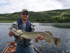 A large pike caught on the fly at Carrowmore Lake, Manulla. Click photo for the latest angling news from local lakes and rivers.