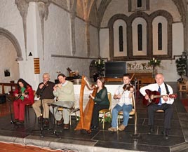 Willie Murphy, Ballyheane, is travelling to South Africa to build houses with the Niall Mellon Trust. Michael Donnelly photographed a benefit concert held at Ballintubber Abbey.