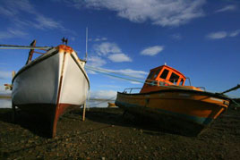 Like these boats, a lot of us are waiting for the tide to change. G Barry has uploaded some new photos to our photo gallery. Click on photo for some great landscapes.