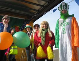 St. Patrick gave a helping hand on the Baxter float at last week's St. Patrick's Day parade. Click on photo for more.