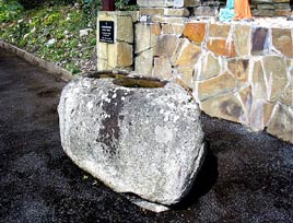 The bullaun stone at Rathduff Church, near Ballina, known as the Carrowmore Stone is described by Mayo Historical and Archaeological Society. Click on photo for details.