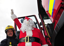 Brian Lenihan bearing gifts? Santa Claus about to bestow gifts on a public sector worker? Click for more from Castlebar's Festive 8th December by Alison Laredo.