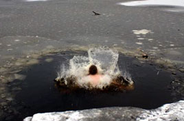 Brrr! Breaking the ice on Lough Lannagh on Christmas Day 2009. Click on photo for more from Noel Byrne. 