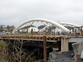 The new bridge over the Castlebar River is beginning to look like a bridge - Jack Loftus has more photos plus McHale Park Stand by night. Click above to view all.