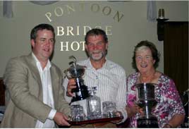 John and Ann Geary present the top prize for their annual end of season fishing competition held on Saturday 25th. Click on photo for more. 