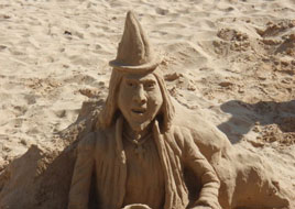 It's Halloween - even on the beach in warmer climes! Click on photo for more sandy witches and ghouls.