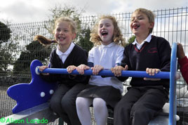 Alison Laredo has photos taken at the opening of the new playground at