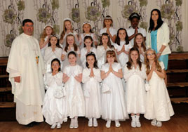 Tom Campbell has photos of St. Angela's first communion classes. Click above for more.