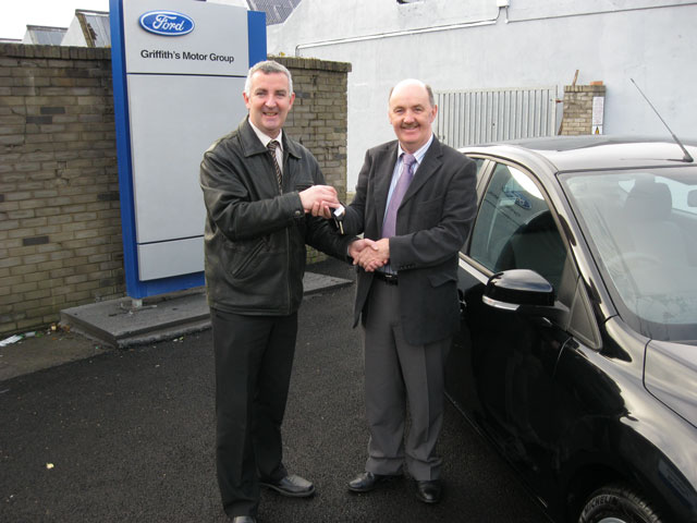 New car dealership Griffith Motors hand over the keys of their first car sold. Click on photo for the details.