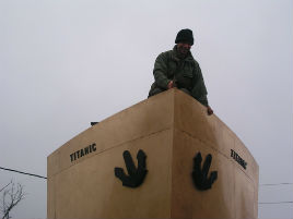 Sculptor Mark Rhode puts the finishing touch to his sculpture of the bow of the RMS Titanic in Lahardane. Click photo for more details.