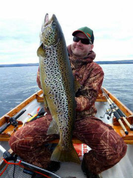 Another very large 'ferox' trout taken on Lough Corrib (and returned). Click on photo for the latest angling news.