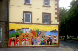 The new Gathering 2013 Mural has brightened up Rock Square. Click on photo for more.