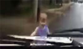 Noel Gibbons has a Shocking video as toddler is hit by a car. Click on photo for more.