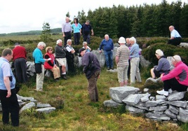 Mayo Historical and Archaeological Society tour North Mayo - here at Rathlacken Court tomb. Click on photo to read more.