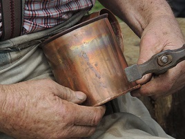 The hands of Master Tinsmith Ted Maughan - Dalemedia has some photos. Click above to view.