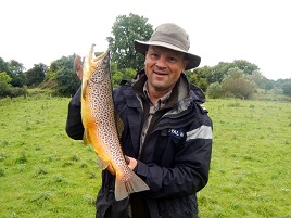 A fine trout from the River Robe. Click on photo for two reports from the west.