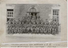 Help JDP identify the men in uniform. Click on photo for more and see discussion on the Nostalgia Board.
