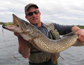 Guide Bodo Funke with a nice Derryhick Lake Pike. Click photo for details from the NW Regional Fisheries Board.