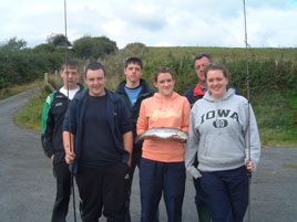Newport AC Junior Angling Group including Caroline Hester with her winning rainbow trout. Click photo for all the latest angling news from the NWRFB.