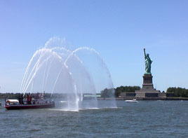 In New York Harbour - Fireboat and Statue of Liberty - photo from John Loftus