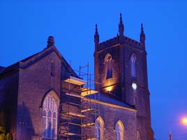 Christchurch lit up with scaffolding in place June 2000