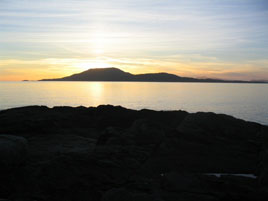 Sunset behind Clare Island. Noel O'Neill waxes lyrical from the vantage point of Roonagh Pier. A nice start to the long weekend.