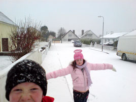 Children enjoying Friday's snowfall in Castlebar. Click for more from Keith.