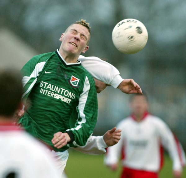 Mayo's Stevie Ryan wins this duel in the Western Cup Final in McSharry Park, Sligo. Photo Michael Donnelly - Click for original page