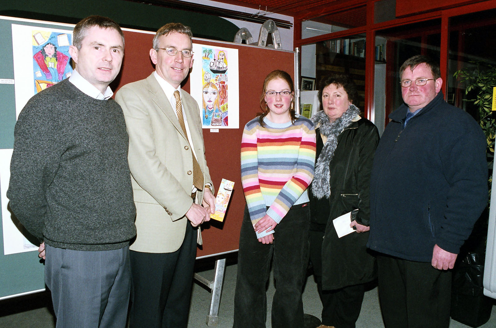 Pictured at Castlebar Library, the Bookmark design competition winner from Book Week: Aoife Healy. L-R: Ivor Hamrock Librarian, Austin Vaughan (County Librarian), Aoife Healy Winner, Geraldine & Pat Healy.  Photo  Ken Wright Photography 2004. 
