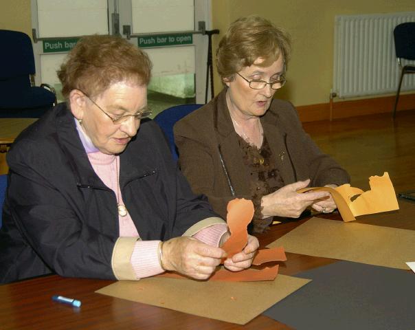 Breda Murphy presenting a visual arts workshop in Balla Community Centre, part of the Arts Office Bealtaine Celebrating Creativity in Older Age. Nora Gavin Photo  Ken Wright Photography 2007.