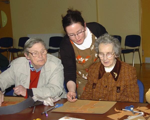 Breda Murphy presenting a visual arts workshop in Balla Community Centre, part of the Arts Office Bealtaine Celebrating Creativity in Older Age Breda Bransfield. and Nora Gavin with Breda Murphy Photo  Ken Wright Photography 2007.