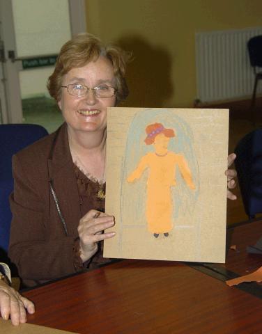 Breda Murphy presenting a visual arts workshop in Balla Community Centre, part of the Arts Office Bealtaine Celebrating Creativity in Older Age. Maureen Kinnane Photo  Ken Wright Photography 2007.

