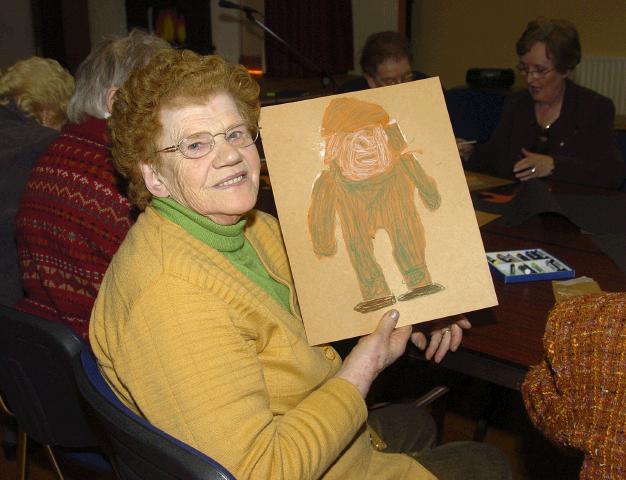 Breda Murphy presenting a visual arts workshop in Balla Community Centre, part of the Arts Office Bealtaine Celebrating Creativity in Older Age. Bridie Jennings Photo  Ken Wright Photography 2007.