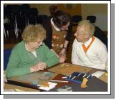 Breda Murphy presenting a visual arts workshop in Balla Community Centre, part of the Arts Office Bealtaine Celebrating Creativity in Older Age. Alice Barrett and Kathleen Reilly with Breda Murphy  Photo  Ken Wright Photography 2007.

