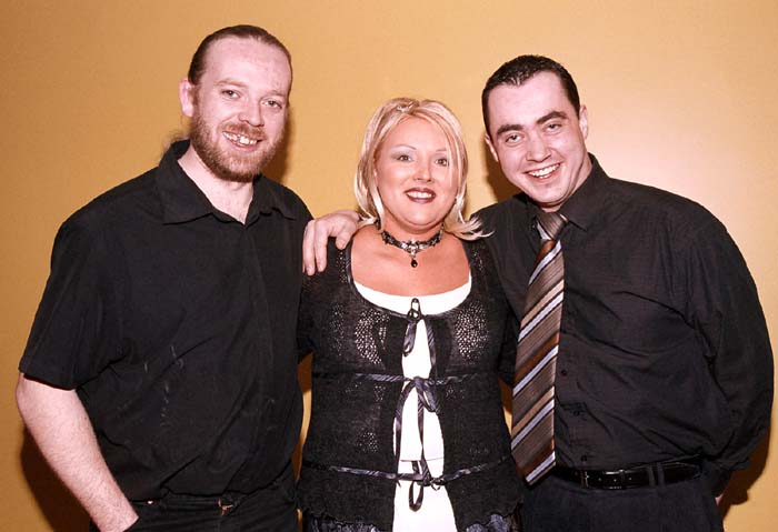 Party time in the TF Royal Theatre Castlebar
A group from Creans and Y2 Cutsl L-R: William Paterson, Helen Malone, Declan Glynn: Photo  Ken Wright Photography 2004 
