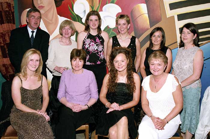 Party time in the TF Royal Theatre Castlebar
A group from Swinford NS Front L-R:Deidre Golding, Attracta Fealey, Louise Docherty, Ann Glavey, Back L_R: Kevin Heneghan, Ann Murtagh, Maeve McDonagh, Dymphna ODonnell, Orla Quinn, Mary Peyton.
Photo  Ken Wright Photography 2004 
