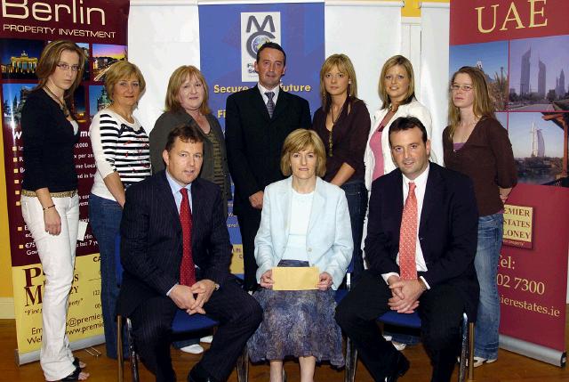 Balla 10k Road Race which was held on 28th July and raised 32,300 Euro which was divided between various charities.  Presentation of a cheque for 17,200 Euro to Aware Front L-R: Michael Maloney (sponsor Premier Estates Maloney), Geraldine Clare (Aware), Cyril Burke (sponsor Premier Estates Maloney). Back L-R: Sinead Walsh (Aware), Mary Brett (Bank of Ireland), Patricia Conwell (Bank of Ireland), Brendan Conwell (Chairman Balla 10k Road Race), Deidre Walsh (Bank of Ireland), Denise McIntyre (Elverys), Rachel Quinn (Tacu Family Resource Centre)Photo  Ken Wright Photography 2007. 