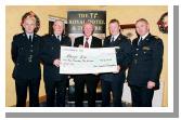 Garda presentation of a cheque to the Bright Eyes Fund for the breast cancer scanner for Mayo General Hospital. L-R: Inspector Tom Fitzmaurice (Swinford), Chief Supt. John Carey
(Castlebar), Denis Gallagher (Chairman Bright Eyes Fund), Asst. Commissioner Dermot Jennings (Galway), Supt. Tony McNamara (Belmullet): 
Photo  Ken Wright Photography 2004. 
