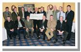 Garda presentation of a cheque to the Bright Eyes Fund for the breast cancer scanner for Mayo General Hospital. Front L-R: Sgt. Martin McDermott (Ballyhaunis), Sgt. John Flannery (Belmullet), Sgt. Joe McKenna (Castlebar), Garda Michael Fadden (Belmullet), Christy Hyland (Retired Garda Westport), Garda Tommy Lyons (Ballina). Back L-R: Sgt. Eamon Bresnan (Castlebar), Garda Linus Fahey (Westport), Sgt. Joe Docherty (Ballina), Chief Supt. John Carey (Castlebar), Denis Gallagher (Chairman Bright Eyes Fund), Asst. Commissioner Dermot Jennings (Galway), Sgt. Thomas McIntyre (Kiltimagh), Garda John Moran (Swinford), Garda Denis Harrington (Westport), Sgt. Tony Cosgrove (Castlebar): Photo  Ken Wright Photography 2004.