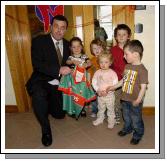 Pictured at the official opening of Mayo County Childcare Committee and Mayo CCC Research new offices in Castlebar by Brian Lenihan TD, a group of children who presented Brian with the Mayo team shirt L-R: Brian Lenihan TD, Niamh Kennedy, Dillon Swift, Nathan Rennick, John Kennedy and Lara .. Photo  Ken Wright Photography 2007. 
