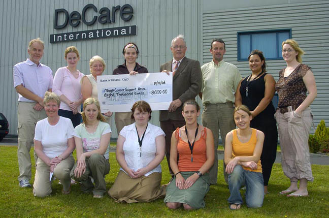 Presentation of a cheque for €8,000 to John Carey Mayo Cancer Support Association Rock Rose House Castlebar from De Care International the proceeds of the De Care Claremorris 10k Road Race, Front L-R: Florence Devane (Mayo Cancer Support Association), Aisling Cawe (De Care), Marie Duffy De Care),Louise Gallagher (De Care), Maureen Ginelly (De Care).Back l-R: Matthew Warrington (De Care), Marion Loftus (De Care), Maureen Walsh (MD De Care), Mairéad Coughlan (De Care), John Carey (PRO Mayo Cancer Support Association), Brendan Conwell (Organiser), Lara McNichols (De Care), Imelda Maloney (De Care): Photo © KWP Studio 094