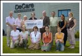  Presentation of a cheque for 8,000 to John Carey Mayo Cancer Support Association Rock Rose House Castlebar from De Care International the proceeds of the De Care Claremorris 10k Road Race, Front L-R: Florence Devane (Mayo Cancer Support Association), Aisling Cawe (De Care), Marie Duffy De Care),Louise Gallagher (De Care), Maureen Ginelly (De Care).Back l-R: Matthew Warrington (De Care), Marion Loftus (De Care), Maureen Walsh (MD De Care), Mairad Coughlan (De Care), John Carey (PRO Mayo Cancer Support Association), Brendan Conwell (Organiser), Lara McNichols (De Care), Imelda Maloney (De Care): Photo  KWP Studio 094

